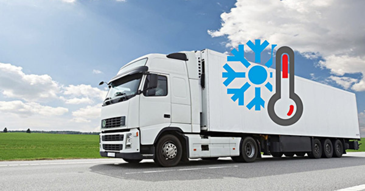 A white refrigerated truck drives on a road against a blue sky. The cargo area shows a snowflake and thermometer icon, symbolizing temperature control.