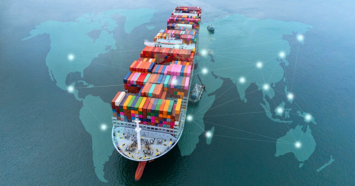 Container ship carries colorful stacked cargo across the ocean, overlayed with a digital world map and glowing network nodes, symbolizing global trade.
